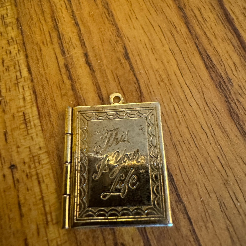 Vintage “This is your Life” gold tone locket.